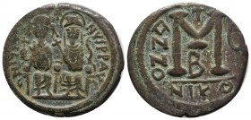 Justin II and Sophia, AD 565-578. AE 40 Nummi (28mm, 12.58g). Nicomedia, year 5 (569/70). Justin and Sophia seated facing on double throne, holding gl...
