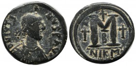 Justinian I. 518-527 AD. AE Follis (29mm, 16.47g). Nicomedia. Diademed, draped and cuirassed bust right. / Large M between two crosses; cross above; B...