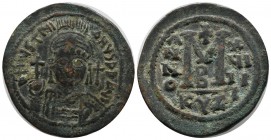 Justinian I. AD 527-565. AE Follis (37mm, 20.35g). Cyzicus mint, 2nd officina. Dated RY 19 (545/6). Helmeted and cuirassed bust facing, holding globus...