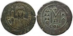 Maurice Tiberius, 582-602 AD. AE Follis (35mm, 12.31g). Constantinople mint, 3th officina. Dated RY 20 (601/2). Helmeted and cuirrased facing bust, ho...