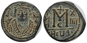 Maurice Tiberius, AD 582-602. AE Follis (26mm, 12.00g). Theoupolis (Antioch), AD 595-596. D N MAVΓ- CNPAVC. Crowned bust of Maurice Tiberius facing, w...