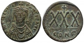 Tiberius II Constantine. AD 578-582. AE 30 Nummi (31mm, 12.15g). Constantinople mint, 3rd officina. Struck 578-579. Crowned, draped, and cuirassed bus...