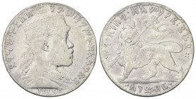 ETIOPIA
Menelik II, 1889-1913.
Birr 1889 (1897).
Ag gr. 27,68
Dr. Busto coronato a d.
Rv. Leone vessillifero verso s. 
KM#19.
BB