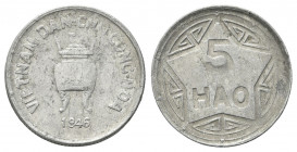 VIETNAM
Vietnam del Nord, 1945 - 1975.
5 Hao.
Al gr. 2,36
Dr. VIET - NAM DAN - CHU CONG - HOA. Calderone. 
Rv. Stella circondata da reticoli cine...