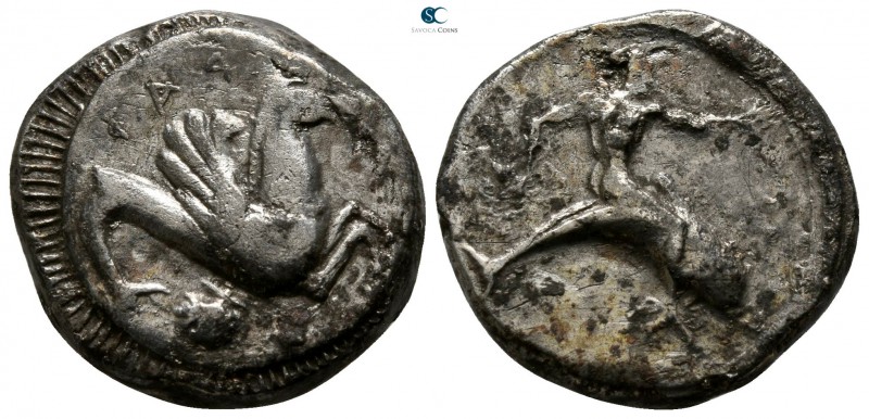 Calabria. Tarentum 500-473 BC. 
Didrachm AR

17mm., 7,96g.

Taras, naked, a...