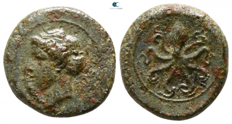 Sicily. Syracuse. Dionysios I. 405-367 BC. 
Tetras Æ

13mm., 2,86g.

Head o...