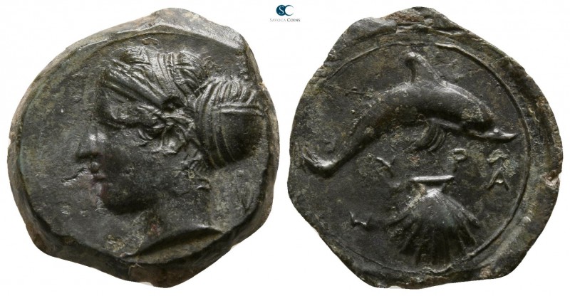 Sicily. Syracuse 405-367 BC. 
Hemilitron Æ

16mm., 3,28g.

Head of Arethusa...