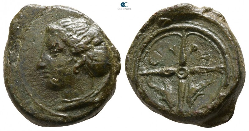 Sicily. Syracuse 405-367 BC. 
Hemilitron Æ

15mm., 4,03g.

Head of Arethusa...