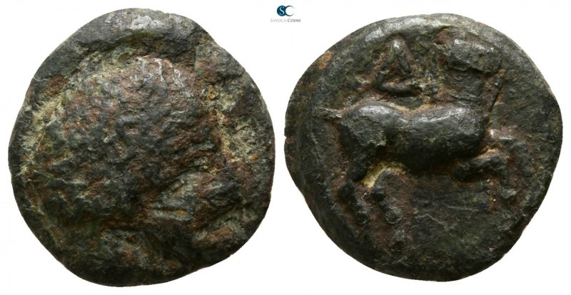 Akarnania. Palairos circa 400-300 BC. 
Drachm Æ

13mm., 2,97g.

Bearded hea...