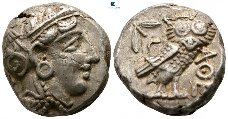 Attica. Athens 353-294 BC. 
Tetradrachm AR

21mm., 17,11g.

Helmeted head o...