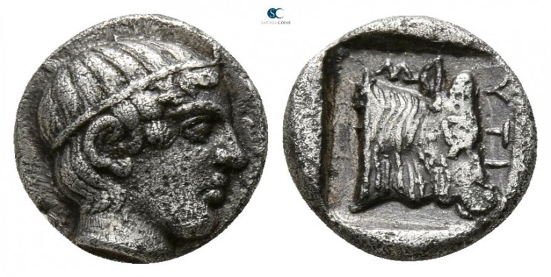 Lesbos. Mytilene 440-400 BC. 
Obol AR

7mm., 0,64g.

Head of Apollo right, ...