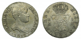 Fernando VII (1808-1833). 1812 IJ. 2 reales. Madrid. (AC.823). 5,86 gr Ar. Busto Desnudo.
MBC