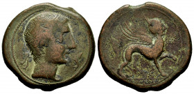 Kastilo-Castulo. Unit. 180 BC. Cazlona (Jaén). (Abh-699). (Acip-2134). (C-31). Anv.: Diademed male head right, dolphin before. Rev.: Sphinx right, leg...