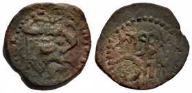 Ebusus. Half unit. 20 BC. Ibiza. (Abh-946). (Acip-757). (C-57). Anv.: Bes holding mace and snake, punic letter alef left. Rev.: Punic legend. Ae. 7,49...