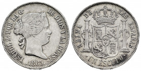 Elizabeth II (1833-1868). 1 escudo. 1865. Madrid. (Cal-563). Ag. 12,81 g. VF/Choice VF. Est...25,00. 

Spanish description: Isabel II (1833-1868). 1...