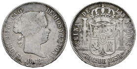 Elizabeth II (1833-1868). 50 centavos de peso. 1868. Manila. (Cal-667). Ag. 12,72 g. Scratch on obverse. Choice F. Est...25,00. 

Spanish descriptio...