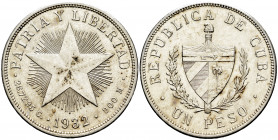 Cuba. 1 peso. 1932. (Km-15.2). Ag. 26,84 g. XF. Est...30,00. 

Spanish description: Cuba. 1 peso. 1932. (Km-15.2). Ag. 26,84 g. EBC. Est...30,00.