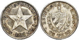 Cuba. 1 peso. 1932. (Km-15.2). Ag. 26,64 g. Light stains. Almost XF. Est...25,00. 

Spanish description: Cuba. 1 peso. 1932. (Km-15.2). Ag. 26,64 g....