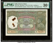 India Reserve Bank of India 100 Rupees ND (1943) Pick 20e Jhun4.7.2B PMG Very Fine 30 Net. Staple holes at issue, rust damage and spindle holes are pr...
