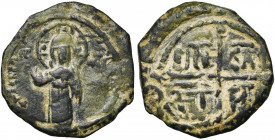 PRINCIPAUTE D''ANTIOCHE, Roger de Salerne (1112-1119), AE follis. 1er type. D/ Le Christ nimbé deb. de f. R/ Croix cantonnée de DNE- SAL/ FT- RO (Domi...