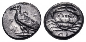 SICILY. Akragas. Circa 450-440 BC. Litra (Silver, 8 mm, 0.57 g, 8 h). ΑΚ - RΑ Eagle, with closed wings, standing left on Ionic column capital. Rev. ΛΙ...