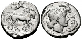 SICILY. Syracuse. Second Democracy, 466-405 BC. Tetradrachm (Silver, 25 mm, 17.27 g, 9 h), c. 450-440. Charioteer, holding reins in left hand and kent...
