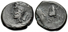 CARTHAGE. Circa 400-350 BC. (Bronze, 18 mm, 6.28 g, 11 h). Wreathed head of Tanit to left. Rev. Horse prancing right. MAA 15. SNG Copenhagen 96. Trace...
