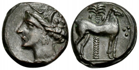 CARTHAGE. Circa 400-350 BC. (Bronze, 15 mm, 2.85 g, 6 h). Wreathed head of Tanit to left. Rev. Horse standing right; palm tree in background; three pe...