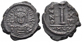Justinian I, 527-565. Decanummium (Bronze, 22 mm, 4.98 g, 5 h), Theoupolis (Antioch), year 24 = 550-551. D N IVSTINI-ANVS P P A V G Helmeted and cuira...