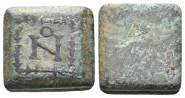 Commercial Weights. Circa 4th - 6th century. Weight of 1-nomisma (Bronze, inlaid with silver, 11.2 x 11 mm, 4.30 g), square commercial weight with pla...