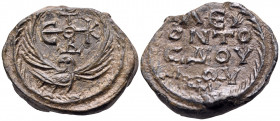 BYZANTINE SEALS. Circa 7th century. Seal or Bulla (Lead, 26 mm, 17.51 g, 12 h). Eagle with spread wings, standing to right turning his head backwards;...
