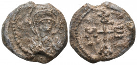 BYZANTINE SEALS. Megas, circa 7th century. Seal or Bulla (Lead, 22 mm, 9.97 g, 12 h). Facing bust of the Virgin Mary, wearing chiton and maphorion, ho...
