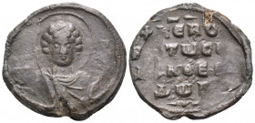 BYZANTINE SEALS. Theodoros. Circa 11th century. Seal or Bulla (Lead, 23.5 mm, 6.91 g, 12 h). Nimbate and draped bust of youthful and beardless St. Geo...
