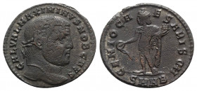 Maximinus II (Caesar, 305-309). Æ Follis (26mm, 7.09g, 12h). Nicomedia, 308-9. Laureate head r. R/ Genius standing l., holding patera and cornucopia; ...