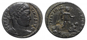Constantine I (307/310-337). Æ Follis (19mm, 2.61g, 12h). Treveri, 323-4. Laureate head r. R/ Victory advancing r., holding trophy and palm, spurning ...