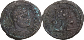 Constantine I (307/310-337). Æ Follis (20mm, 3.80g). Siscia - R/ Standard with captives. Good Fine