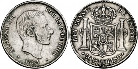 1884. Alfonso XII. Manila. 50 centavos. (Cal. 84). 12,73 g. Limpiada. Escasa. MBC/MBC+.