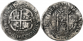 1669/8. Carlos II. Potosí. E. 8 reales. (AC. 664) (Lázaro 181, mismo cuño de anverso). Redonda. Tipo "real". Rectificación en la fecha del anverso. Do...