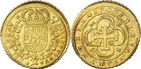 1707. Felipe V. Sevilla. M. 8 escudos. (AC. 2275) (Cal.Onza 489). Tipo "cruz". M-8-8-S. Muy bella. Brillo original. Rara y más así. 26,85 g. EBC+.
