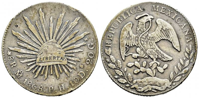 Mexico. 8 reales. 1868. México. PH. (Km-377.10). Ag. 26,86 g. Patina. Minor nick...