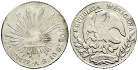 Mexico. 8 reales. 1877. Oaxaca. AE. (Km-377.11). Ag. 27,05 g. Adjustment lines. VF/Almost VF. Est...50,00. 

Spanish description: México. 8 reales. ...