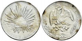 Mexico. 8 reales. 1894. Zacatecas. FZ. (Km-377.13). Ag. 26,76 g. Irregular patina. VF. Est...50,00. 

Spanish description: México. 8 reales. 1894. Z...