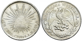 Mexico. 1 peso. 1899. Culiacan. AM. (Km-409). Ag. 26,69 g. Scarce. Choice VF. Est...60,00. 

Spanish description: México. 1 peso. 1899. Culiacán. AM...
