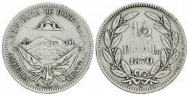Honduras. 1/2 real. 1872. (Km-32). Ag. 6,09 g. Choice F. Est...20,00. 

Spanish description: Honduras. 1/2 real. 1872. (Km-32). Ag. 6,09 g. BC+. Est...