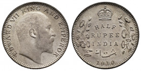 British India. Edward VII. 1/2 rupee. 1910. Calcutta. (Km-507). Ag. 5,87 g. Delicate patina. A good sample. Mint state. Est...90,00. 

Spanish descr...