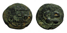 Dirhem AE
Artuquids (Mardin), Nasir ad-Din Artuq Arslan (597 - 637 AH / 1201 – 1239 AD), Male figure enthroned facing crosslegged, resting right hand...