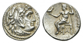 KINGS OF MACEDON. Philip III Arrhidaios, (Circa 323-317 BC).Drachm. Side.
Obv: Head of Herakles right, wearing lion skin.
Rev: ΦIΛIΠΠΟΥ.
Zeus seate...