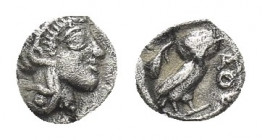 ATTICA, Athens (Circa 454-404 BC). Hemiobol.
Obv: Helmeted head of Athena right.
Rev: AΘΕ.
Owl standing right, head facing; olive sprig to left.
K...