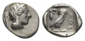 ATTICA. Athens. Drachm (Circa 454-404 BC).
Obv: Helmeted head of Athena right.
Rev: AΘE.
Owl standing right, head facing; olive sprig to left; all ...