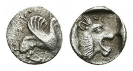 TROAS, Assos. (Circa 500-450 BC). AR Obol.
Obv: Griffin seated right, raising forepaw.
Rev: ΑΣΣ (retrograde). Head of roaring lion right within incu...